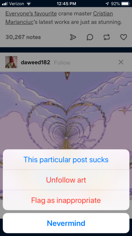 A screenshot of the Tumblr iOS app; the options to hide a post are "This particular post sucks," "Unfollow art," and "Flag as inappropriate". 